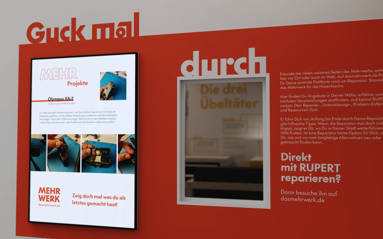 Die rote Wand „Guck mal durch“ mit einem Bildschirm, Projektbildern und dem Hinweis „Direkt mit RUPERT reparieren?“.
